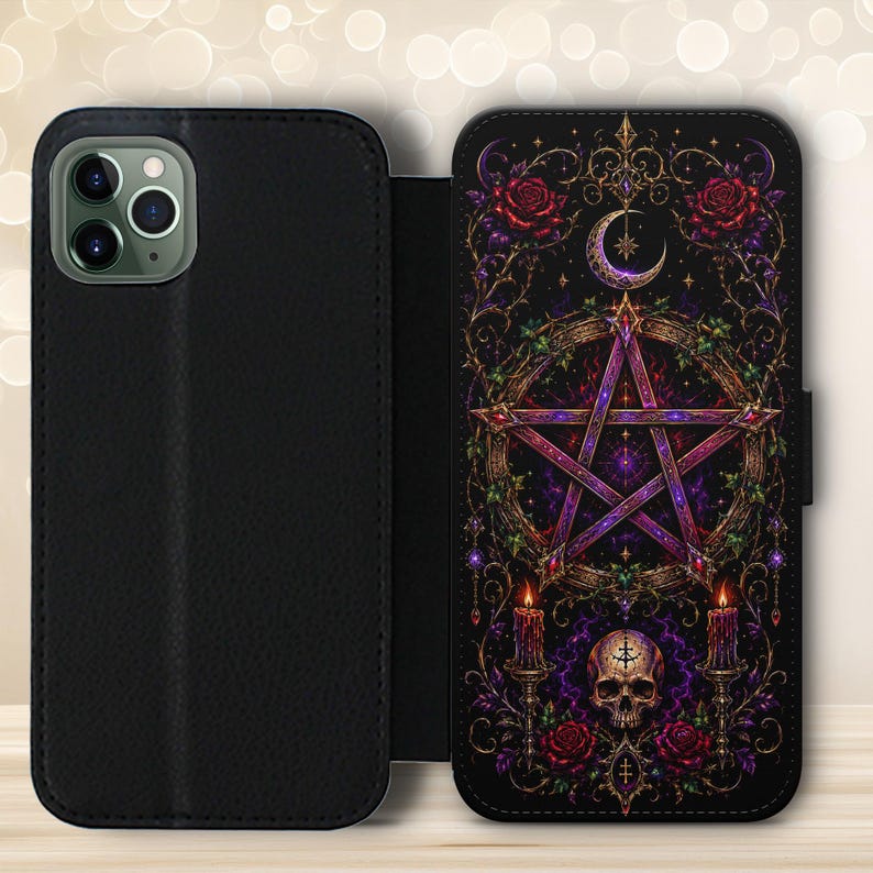 May include: A black wallet-style phone case featuring a detailed graphic print on the interior panel. The design displays a central pentagram, a crescent moon, a human skull, two lit candles, and red roses, all set against a dark, ornate background.