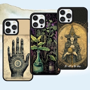 May include: Three different phone cases with a variety of designs. The first case features a hand with an eye in the palm, the second case features a variety of plants and herbs, and the third case features a witch holding a crystal ball with the text "It's all in the stars".