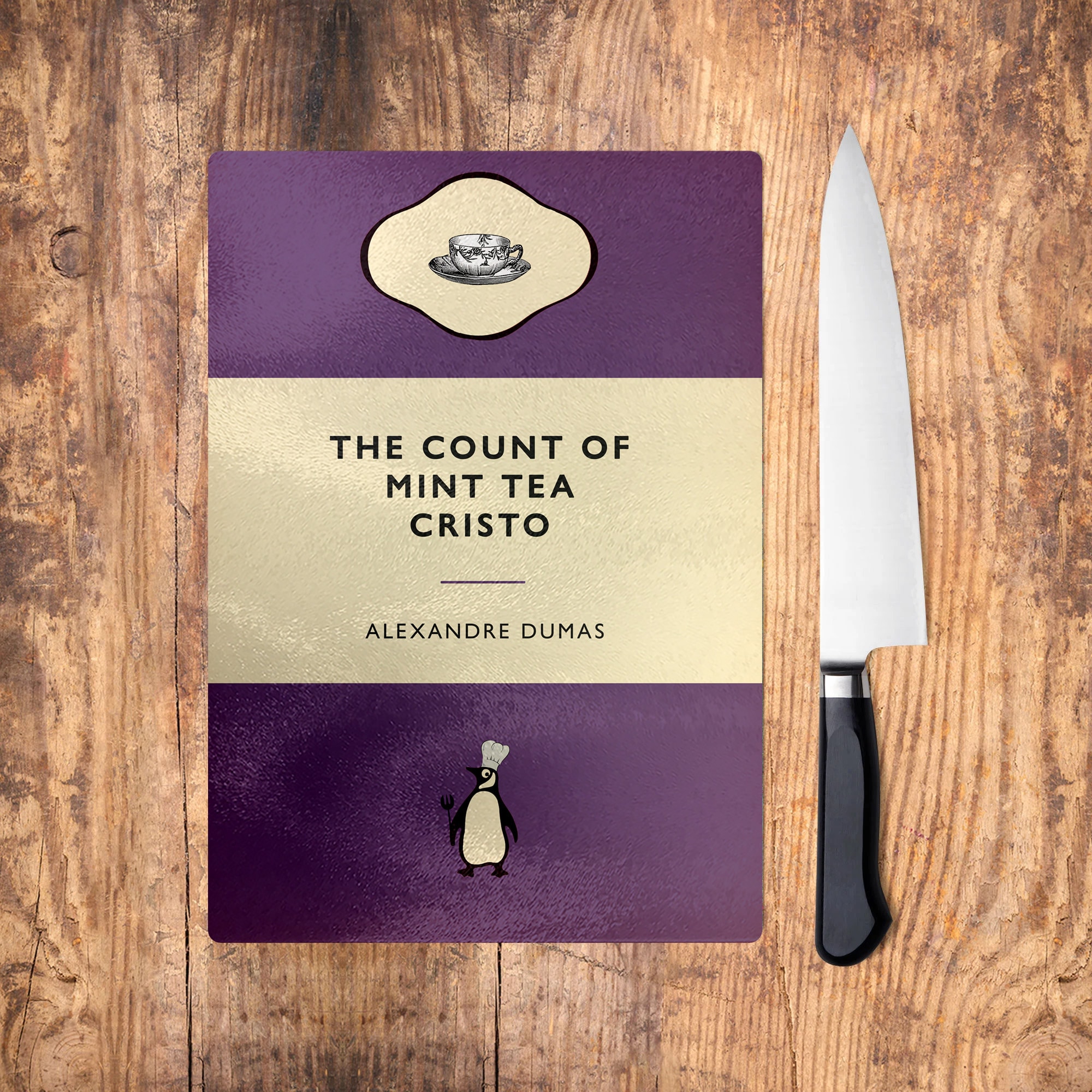 The Count of Mint Tea Cristo Penguin Classic Glass Chopping Board 2 styles available. The Count of Monte Cristo literary pun