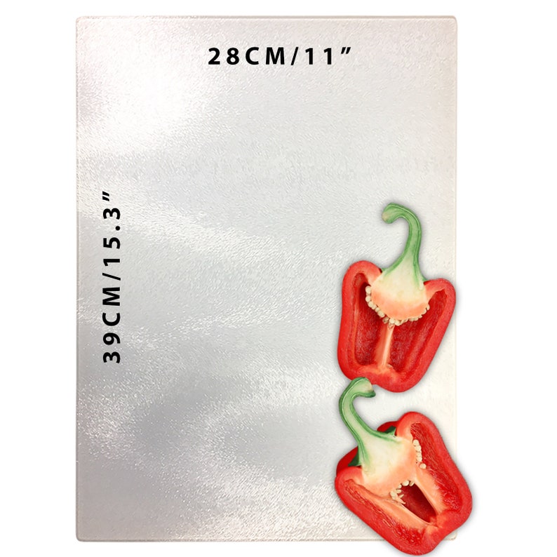 May include: A white, rectangular cutting board with a textured surface. The board measures 15.3 inches by 11 inches. Two halves of a red bell pepper are on the board.