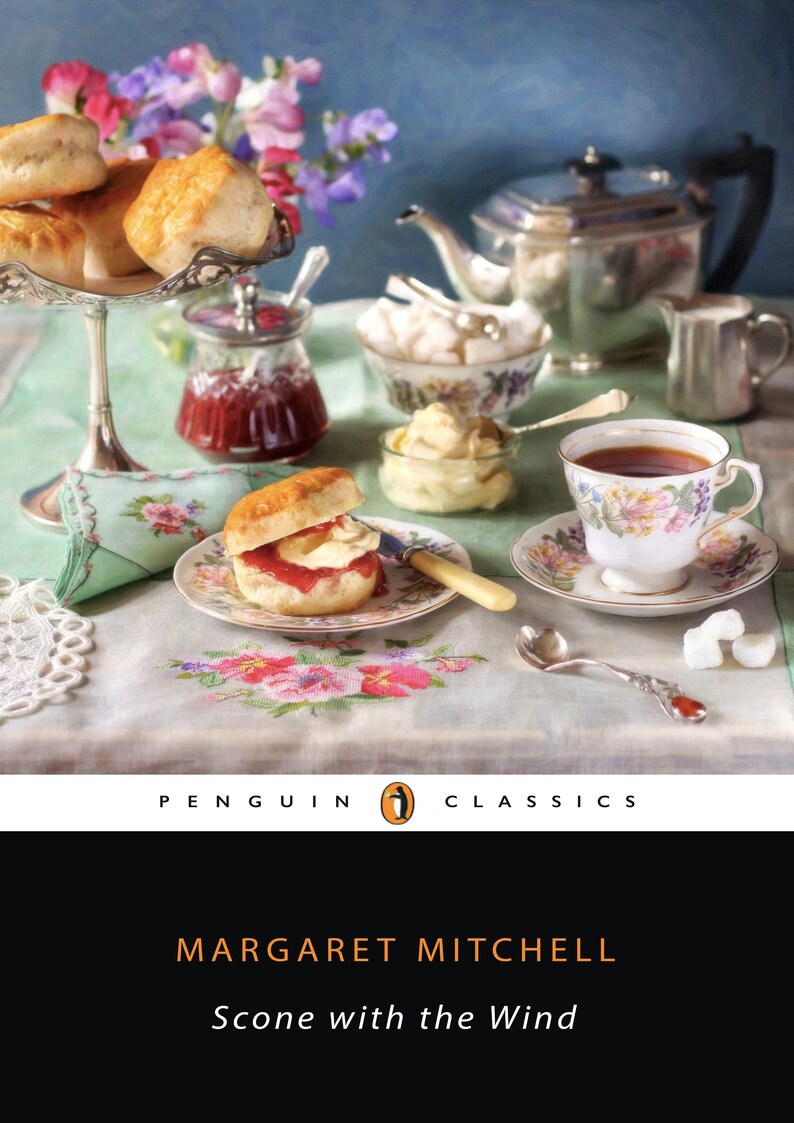 May include: A vintage book cover with a Penguin Classics logo. The cover features a still life image of a tea party with scones, jam, clotted cream, teacups, and sugar cubes. The title of the book is "Scone with the Wind" by Margaret Mitchell.