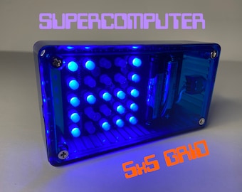 May include: A blue, clear plastic box with a grid of blue LED lights inside. The box has "SUPERCOMPUTER" written on the top and "SHS GRID" written on the bottom.