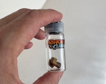 Miniature de Ratchet and Clank Bolt dans une bouteille