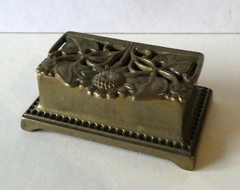 Rare brass ashtray, lid beautifully decorated, probably Art Deco.