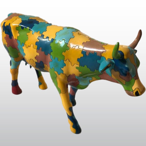 Puzzle cow from the 2001 Cow Parade in Kansas City, USA, designed by Sarah Butler & Darryl Woods, resin, painted