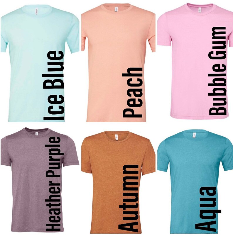 May include: Six different colored t-shirts with the color names printed vertically on the right side of each shirt. The colors are ice blue, peach, bubble gum, heather purple, autumn, and aqua.