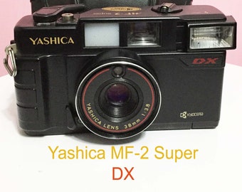 YASHICA MF 2 Super DX Camera/ Kyocera Camera / Great condition/ Yashica Lens 38 mm/Orginal Case / Rangefinder 35 mm Film Camera