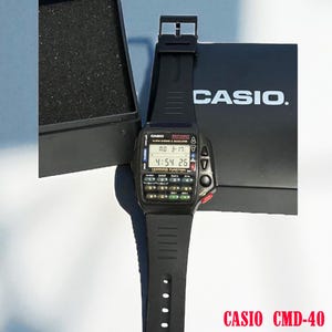 Vintage Casio CMD-40 Japan Learning tv Remote Control/ Modüle 1174 / Orginal Soft Slicone Strap/ Digital wrist watch/With spare cord !!!