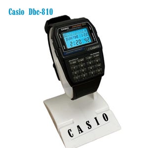 Calculadora Casio DBC-810/ Módulo Reloj 1476 Vintage/Muy buen estado/ DBC-810 Databank 80/ Acero inoxidable