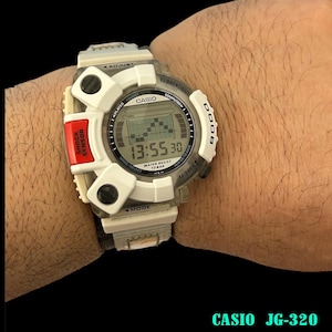 May include: A white Casio digital watch with a black face and red accents. The watch has a black band and the words "Shock Sensor" and "1/100 Sec" are printed on the face. The watch is water resistant to 10 bar.