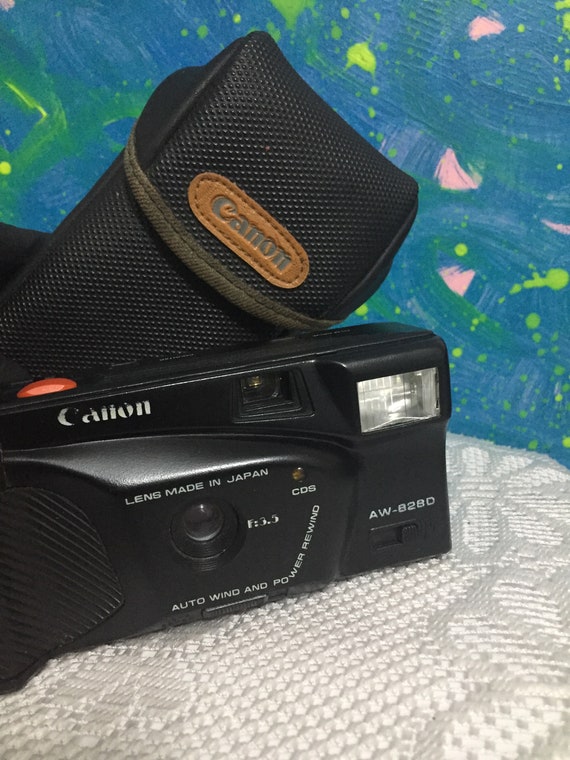 Vintage Canon AW 828-D /LENS Made in Japon/ Auto Wind/ Canon Mate