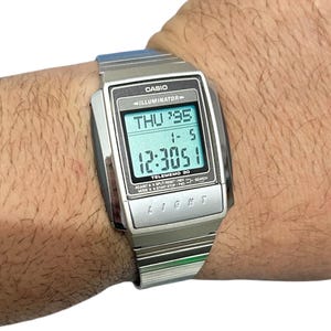 Vintage Casio A-210 Digital Watch: Stainless Steel Illuminator, Alarm, Boxed