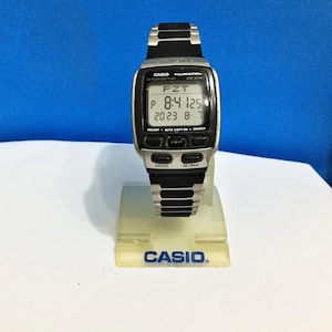 Casio DB-37H illuminator/ Telememo Multi Lingual Data bank/ Chrono Alarm Vintage Original Digital Watch/ New cord never used/ Mod: 2524