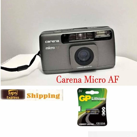 Carena Micro AF Point and shoot/ Vintage Camera/ (Konica Big Mini BM-100) / Works very well. Will ship with battery and Leather CASE