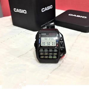 Controle remoto de TV Casio CMD-40 antigo para aprendizado/ Módulo 1174 / Pulseira de silicone macio original/ Relógio de pulso digital/ Com cabo extra !!!