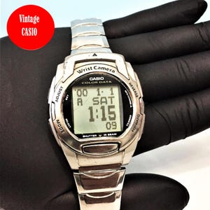 Rare Casio WQV-3 Wrist Camera Watch Module 2411/ Orginal Stell Cord/ Original casio / Great collectible watch/ Silver  Color case Rare model