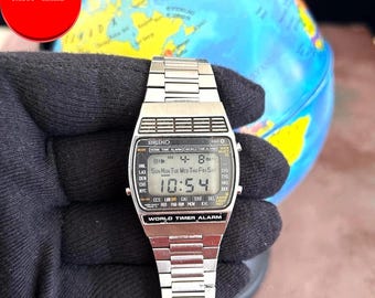 【ジャンク】SEIKO WORLD TIMEゴールド デジタル腕時計 Yahoo!オークション -「seiko ワールドタイム デジタル」の落札