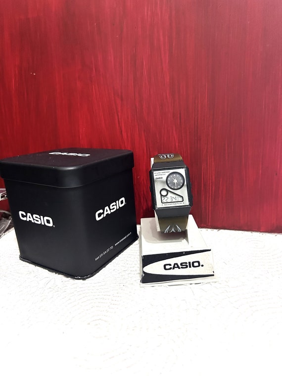 Vintage CASIO Filmwatch FS-03 (5858) Dual Time Quartz Watch and Digital Very good cosmetic condition for collection