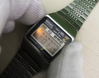 Seiko Quartz LC Chronograph A128-5000 - YouTube