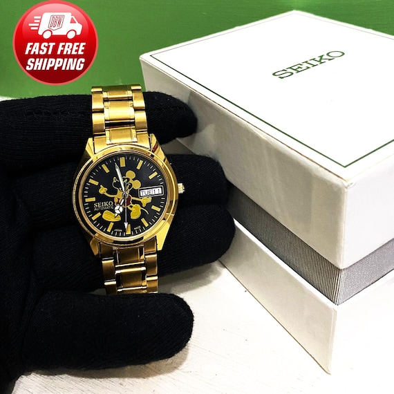 Seiko gold mickey mouse watch hotsell