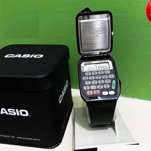 Casio Flip Top FTP-30 Vintage Com pulseira original / Módulo 761 / Relógio masculino feito no Japão Funciona bem / Muito bom estado / Calculadora Flip Top