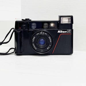 Vintage Nikon L35AF 35mm Point & Shoot Film Camera JAPAN/ With Case and With Duracell Batery /   f/2.8 - One Touch Analog Camera/ 1980s