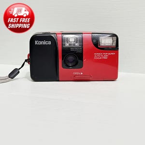 Rare Konica POP-SUPER Red 35mm Film Camera Japan/ Very good condition/ Leather Case/ Gp Battery / Point and Shoot/ Auto Flash Focus Free.