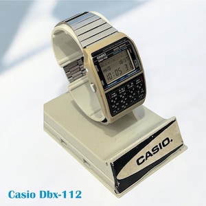 Vintage Casio Watch Data Bank DBX-112 Retro Watch /Very Good Condition/ Original Casio Tin Box. / MOD:642/World Time Retro Watch