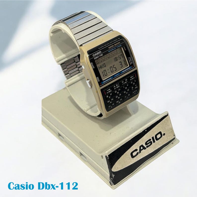 Vintage Casio Watch Data Bank DBX-112 Retro Watch /Very Good Condition/ Original Casio Tin Box. / MOD:642/World Time Retro Watch