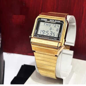 RARE GOLD tone Casio DB-310 Data Bank Watch Module 871/Data Bank Vintage 80’S Digital display with defect 33mm/ Good condition overall