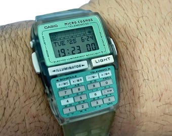 時計 CASIO DATA BANK micro cosmos DBC-63 Vintage Nos Casio Dbc-63 Micro Cosmos Telememo 50 Databank Memory