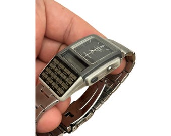 Vintage Casio ABC-31 Calculator Watch - Digital Data Bank