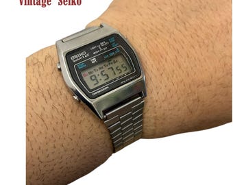 Reloj digital LCD de acero Seiko A128-5010 vintage: muy buen estado.