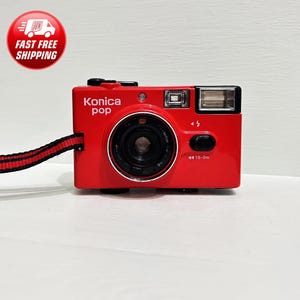 Vintage Konica Pop Pomegranate color 35mm Film/With Battery Camera/Point and Shoot film /Japan Konica Black Case/ / Cameras  Very nice color
