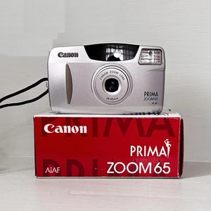 Unused Canon Prima Zoom 65 /Vintage / Wiht Box and user manual/ 38-65mm Canon Zoom Lens./ 35 mm vintage camera /Original Case & Gp Battery
