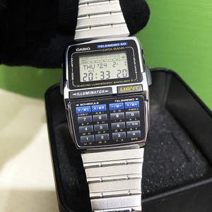Execelent Nos Casio Dbc-63 Databank Telememo 50 Memory Calculator Watch 1990s Vintage / Mod: 1276 / With Tin Casio Box/ Very good condition
