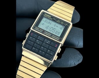 ULTRA RARE Casio DBX-100 Gold Color  Calculator Watch  mod 261 Japan 1980s  Very good Cosmetic Condition. Special for Collection