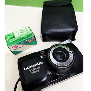 Vintage Olympus Infinity Stylus ZOOM 105 Weatherproof 35mm Camera, Black with 35-105mm Lens/ With Vintage film and Battery