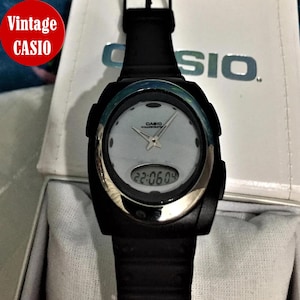RETRO Casio AQ-E10 Ana-Digi/  Module 2384 / Vintage Men’s Watch /Very good condition/Rare collectible item