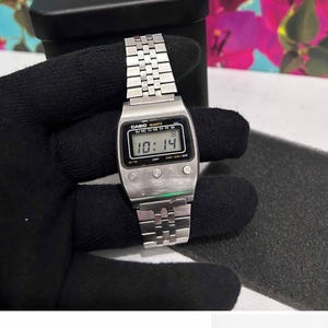 RARE Casio 50QS-17 3 BUTTON Led Digital Watch Fully working Japan Made Vintage Front Button Casio Tin Box Good condition for collection