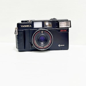 YASHICA MF 2 Super DX Kamera/ Kyocera Kamera / Super Zustand/ Yashica Objektiv 38 mm/Orginal Tasche / Messsucher 35 mm Film Kamera