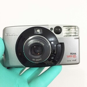 Canon Prima Super 105, cámara de película, 35 mm, apuntar y disparar, enfoque automático, canon sure shot, cámara compacta, zoom, af, fotografía, retro