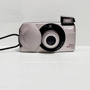 Canon PRIMA SUPER 28, film camera, point and shoot, compact camera, retro camera, analog camera, 35mm film, focus, 28, Point & Shoot, sure