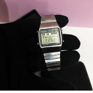 Vintage  Seiko Lc Chronograph /  A128-5000 / 1978 Seiko 12kt Silver Color A128 Series/ Silver Toner Watch/ The light is work