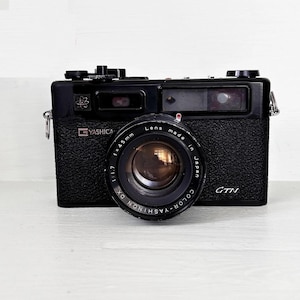 Vintage Yashica Electro 35 GTN Vintage Rangefinder Film Camera/Tumax Flash/ Very Good Condition,/ Black Color Orginal Case/ Made in Japan