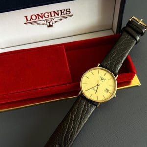 Vintage Longines Presence Quartz Wacth Swiss V8 L156.4 Six Jewels Longines Box Gold plated  Very good cosmetic condition