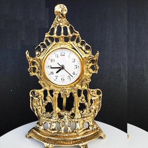 Vintage  Brass fireplace clock / Mantel Clock /Quartz Movement/ Very good condition. It works very well/ Mother Gift home decor/