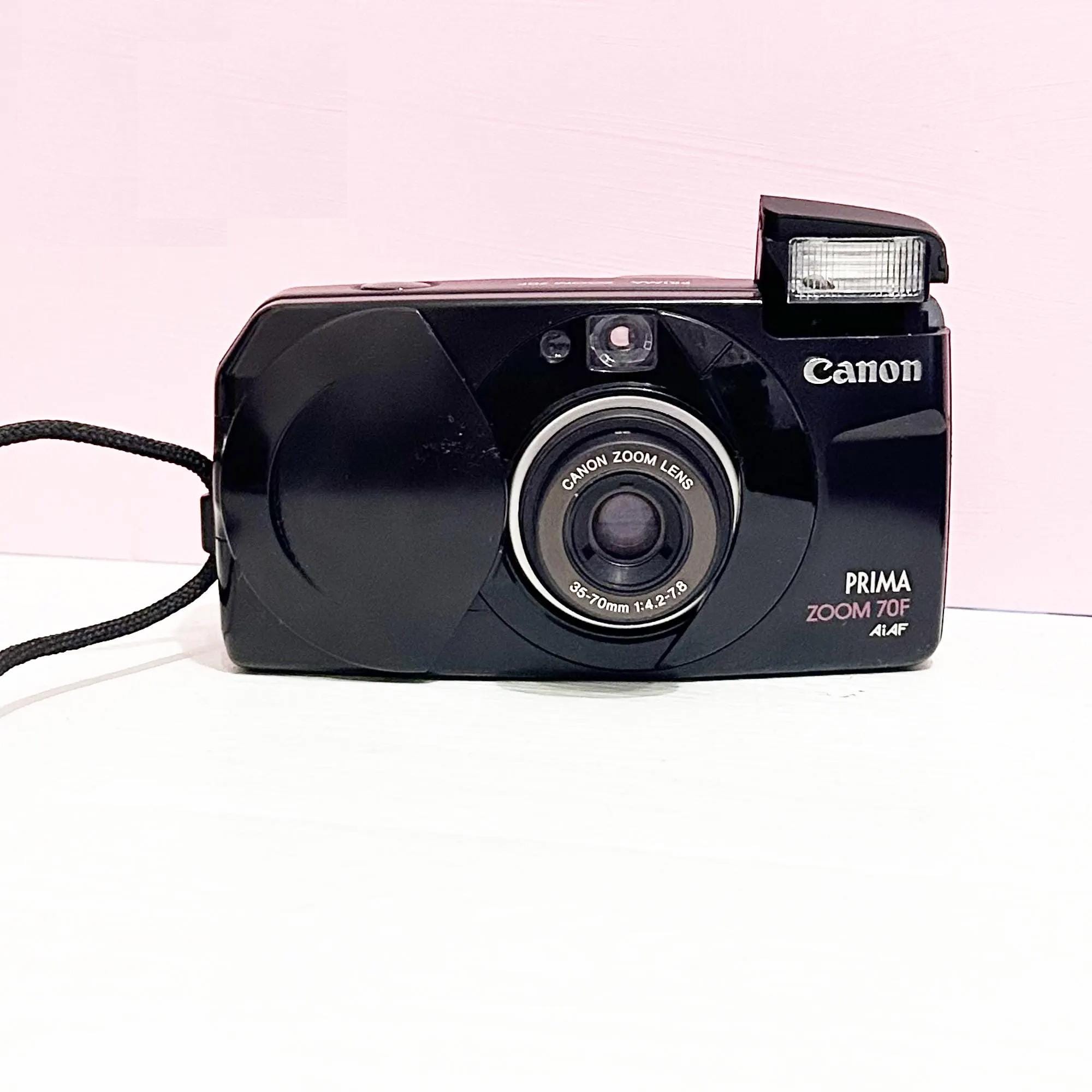 Analog Canon Prima  Zoom 70 F/ Zoom  35mm Compact/Black Analog Camera //Great condition/ Black Color /With Gp Cr123a Battery