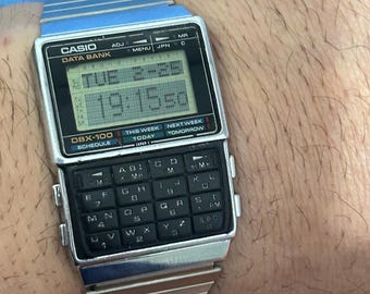 時計 CASIO DATA BANK VCL-100S-2T Casio TL-100-s Two Way Display Data Bank Calculator 100
