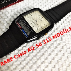 Rare  Japon Casio VINTAGE AQ-50 MODULE 371/Rare Collectible watch/ Wrist Watch White Dial/ Collection complement/Very good condition